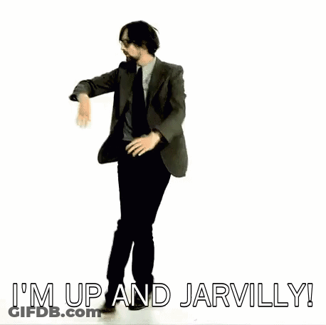 Man In Suit And Black Pants Standing With Arms Out GIF