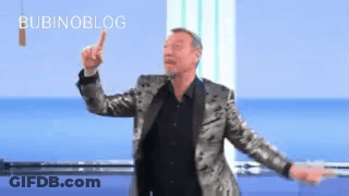 Man In Suit And Black Shirt Dancing Pointing Up GIF