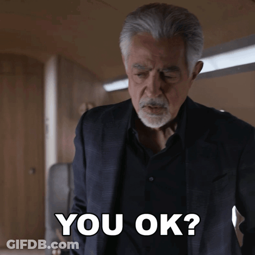 Man In Suit And Black Shirt Says You Ok GIF