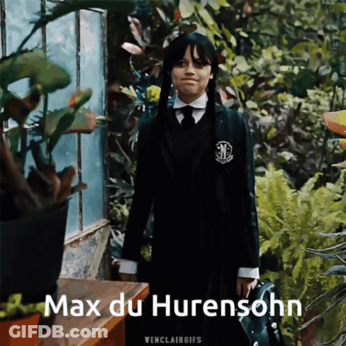 Man In Suit And Blue Shirt In City GIF
