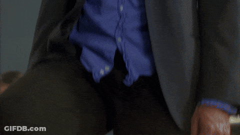 Man In Suit And Blue Shirt Making Face GIF