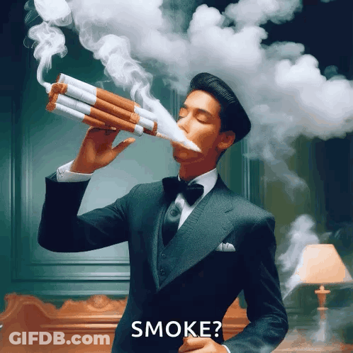 Man In Suit And Bow Tie Blowing Smoke GIF