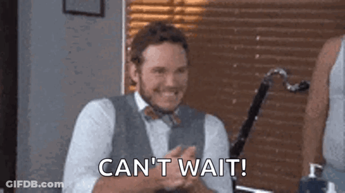 Man In Suit And Bow Tie Clapping GIF