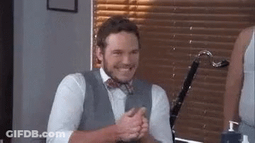 Man In Suit And Bow Tie Clapping GIF