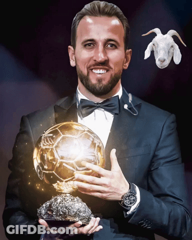 Man In Suit And Bow Tie Holding Trophy GIF