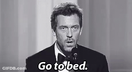 Man In Suit And Bow Tie Saying Go To Bed GIF