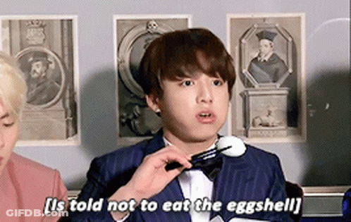 Man In Suit And Bow Tie Saying Not Eating Eggshell GIF