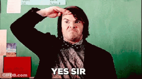 Man In Suit And Bow Tie Saying Yes GIF