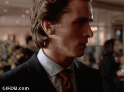 Man In Suit And Bow Tie Smiling Smitten Sigma GIF