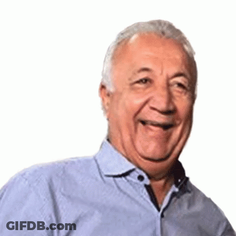Man In Suit And Bow Tie Smiling GIF