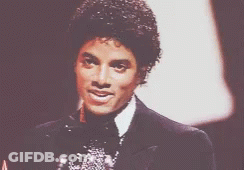 Man In Suit And Bow Tie Smiling GIF