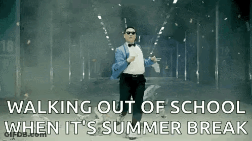 Man In Suit And Bow Tie Walking Out Of School GIF