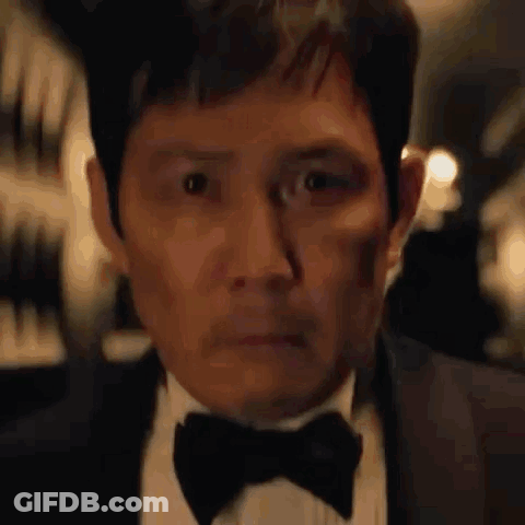 Man In Suit And Bow Tie GIF