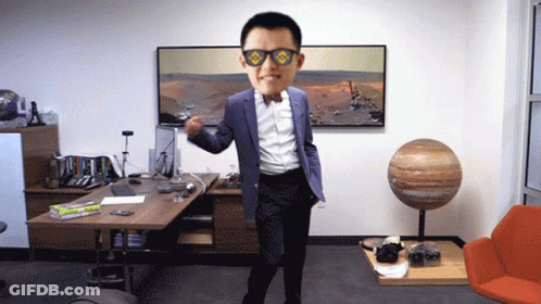 Man In Suit And Bowtie Dancing Before Mars Picture GIF