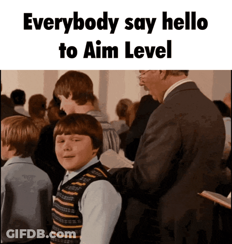 Man In Suit And Boy In Striped Vest Say Hello GIF