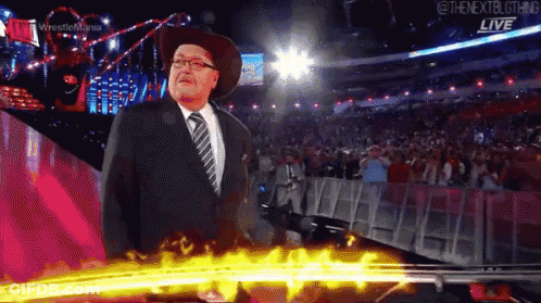 Man In Suit And Cowboy Hat At Wrestlemania GIF