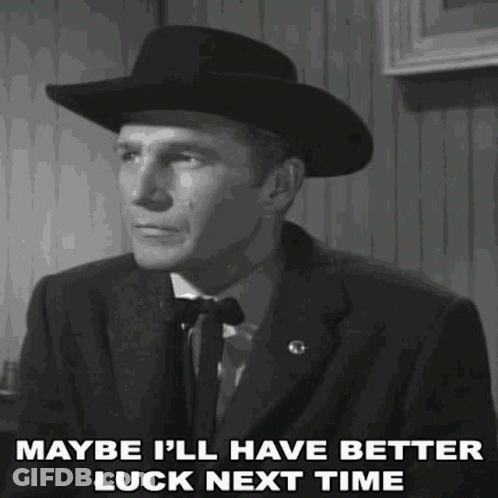 Man In Suit And Cowboy Hat Saying Maybe Better Luck Next Time GIF