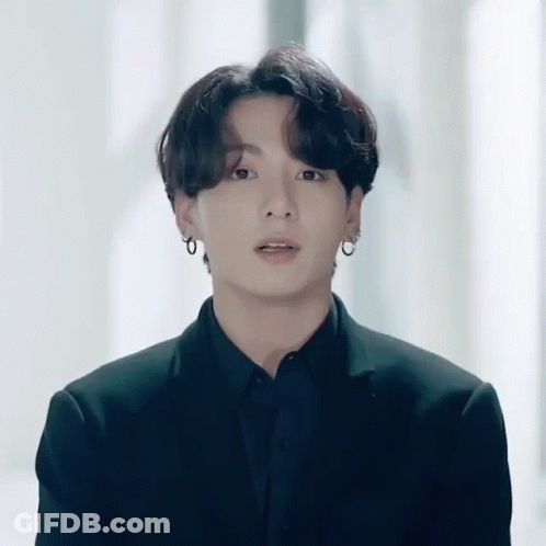 Man In Suit And Earrings GIF