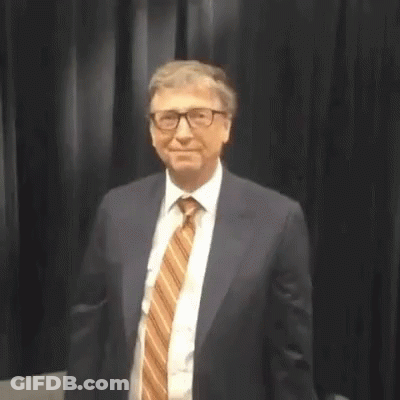 Man In Suit And Glasses Arms Outstretched GIF