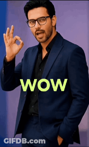 Man In Suit And Glasses Giving OK Sign Says Wow GIF