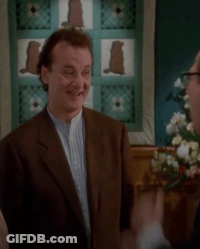 Man In Suit And Glasses Next To Man In Suit GIF