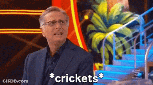 Man In Suit And Glasses Saying Crickets GIF