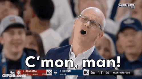 Man In Suit And Glasses Shouts C'mon Man GIF