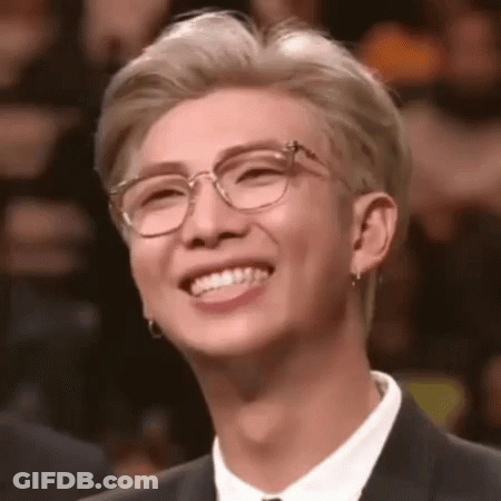 Man In Suit And Glasses Smiling GIF