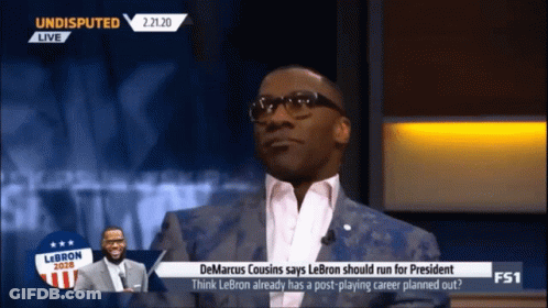 Man In Suit And Glasses Talking On Undisputed GIF