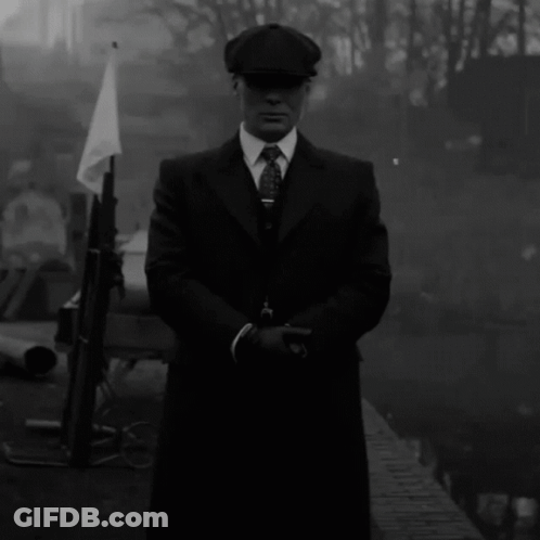Man In Suit And Hat By River GIF