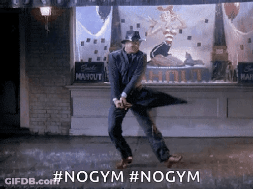 Man In Suit And Hat Dancing In Rain NoGym GIF