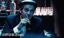 Man In Suit And Hat Drinking Whiskey GIF