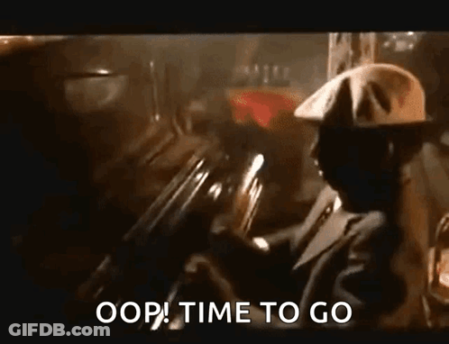 Man In Suit And Hat Driving Car GIF