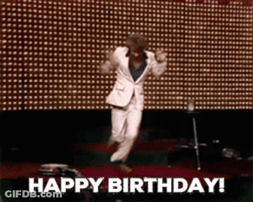 Man In Suit And Hat Jumping GIF