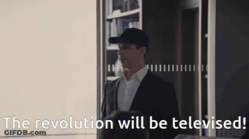 Man In Suit And Hat Saying The Revolution Will Be Televised GIF