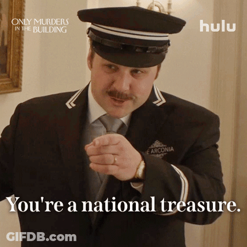 Man In Suit And Hat Says You're A National Treasure Hulu Ad GIF