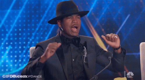 Man In Suit And Hat Speaking Into Microphone World Of Dance GIF