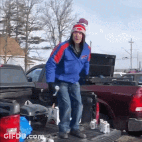 Man In Suit And Hat Standing In Front Of Stadium With Arms Crossed Says Papa B34r GIF