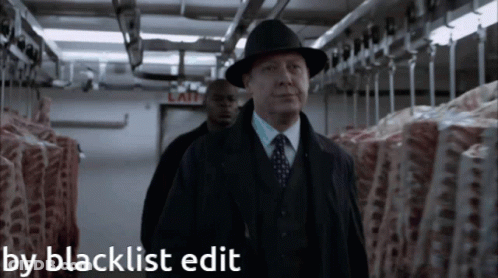 Man In Suit And Hat Walking Through Meat Locker By Blacklist Edit GIF