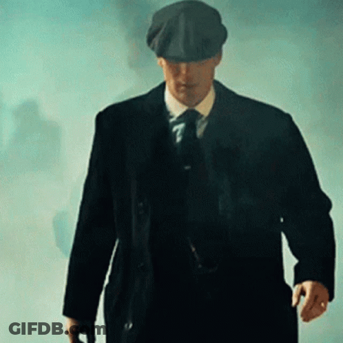 Man In Suit And Hat Walking With Cane GIF