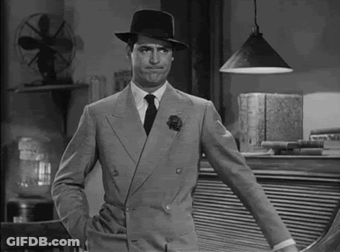 Man In Suit And Hat With Hand In Pocket GIF
