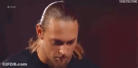 Man In Suit And Headphones Shaking Hands In Ring GIF