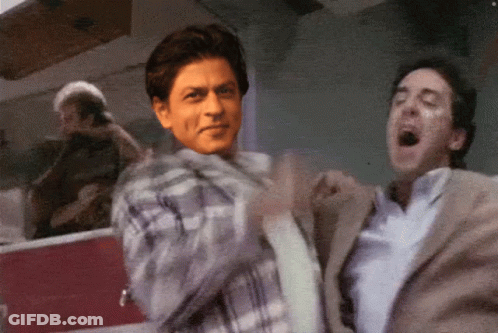 Man In Suit And Man In Plaid Shirt Dancing GIF