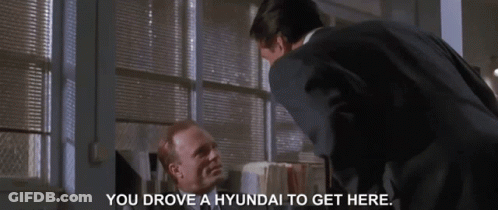Man In Suit And Man Saying You Drove A Hyundai To Get Here GIF