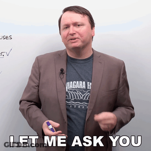 Man In Suit And Niagara T-Shirt Says Let Me Ask You GIF