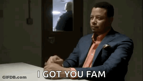 Man In Suit And Orange Shirt Talking GIF