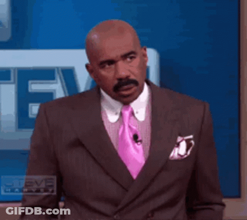 Man In Suit And Pink Tie In Front Of Steve TV GIF