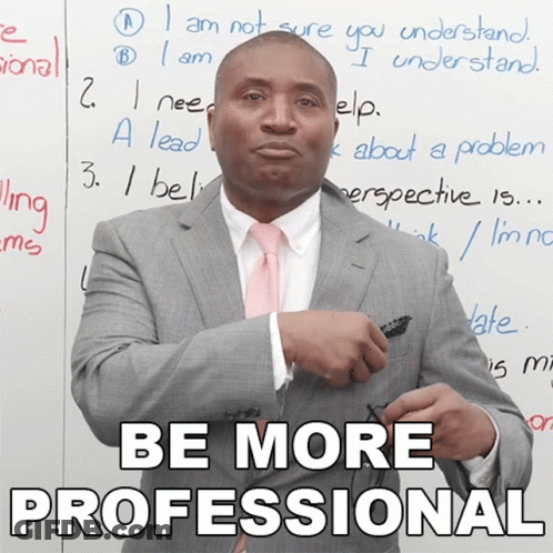 Man In Suit And Pink Tie Saying Be More Professional GIF