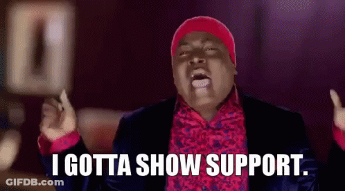 Man In Suit And Red Hat Saying I Gotta Show Support GIF