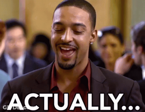 Man In Suit And Red Shirt Laughing Saying Actually GIF